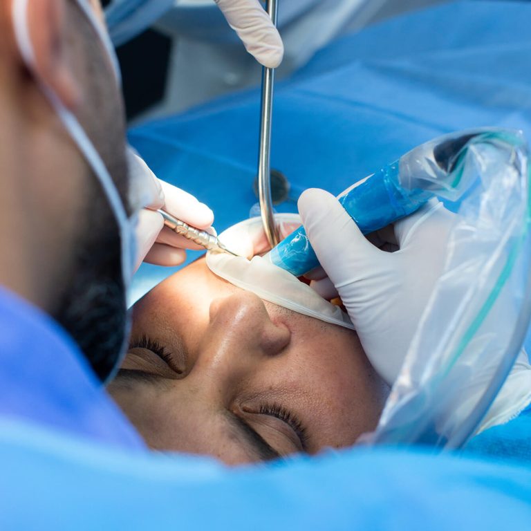 dentist-assistant-with-tool-makes-some-manipulations-patient-s-mouth (1)